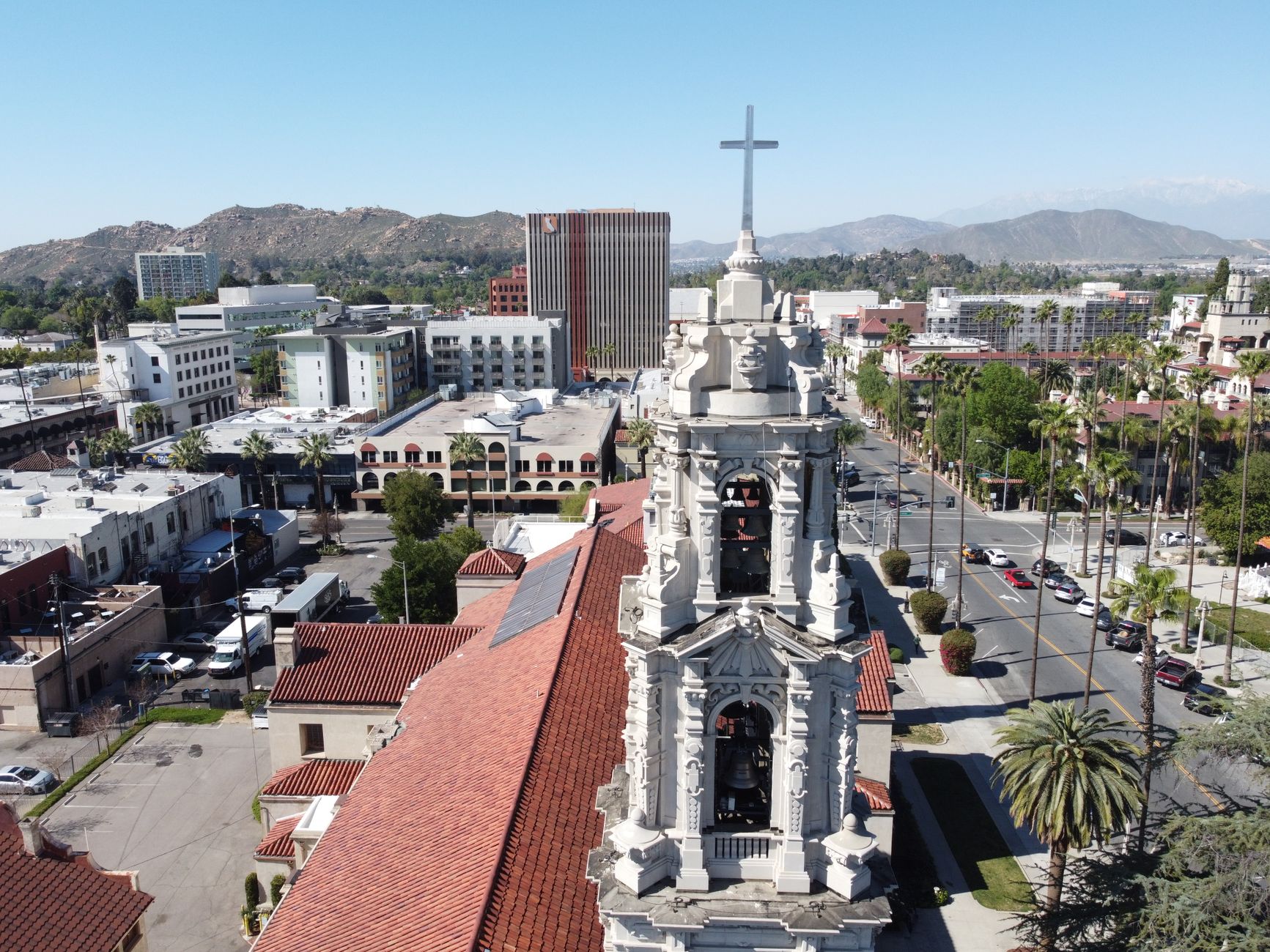 Explore a stunning aerial shot of Downtown Riverside, CA, featuring a historic cathedral